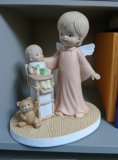 Angel with Baby in Highchair